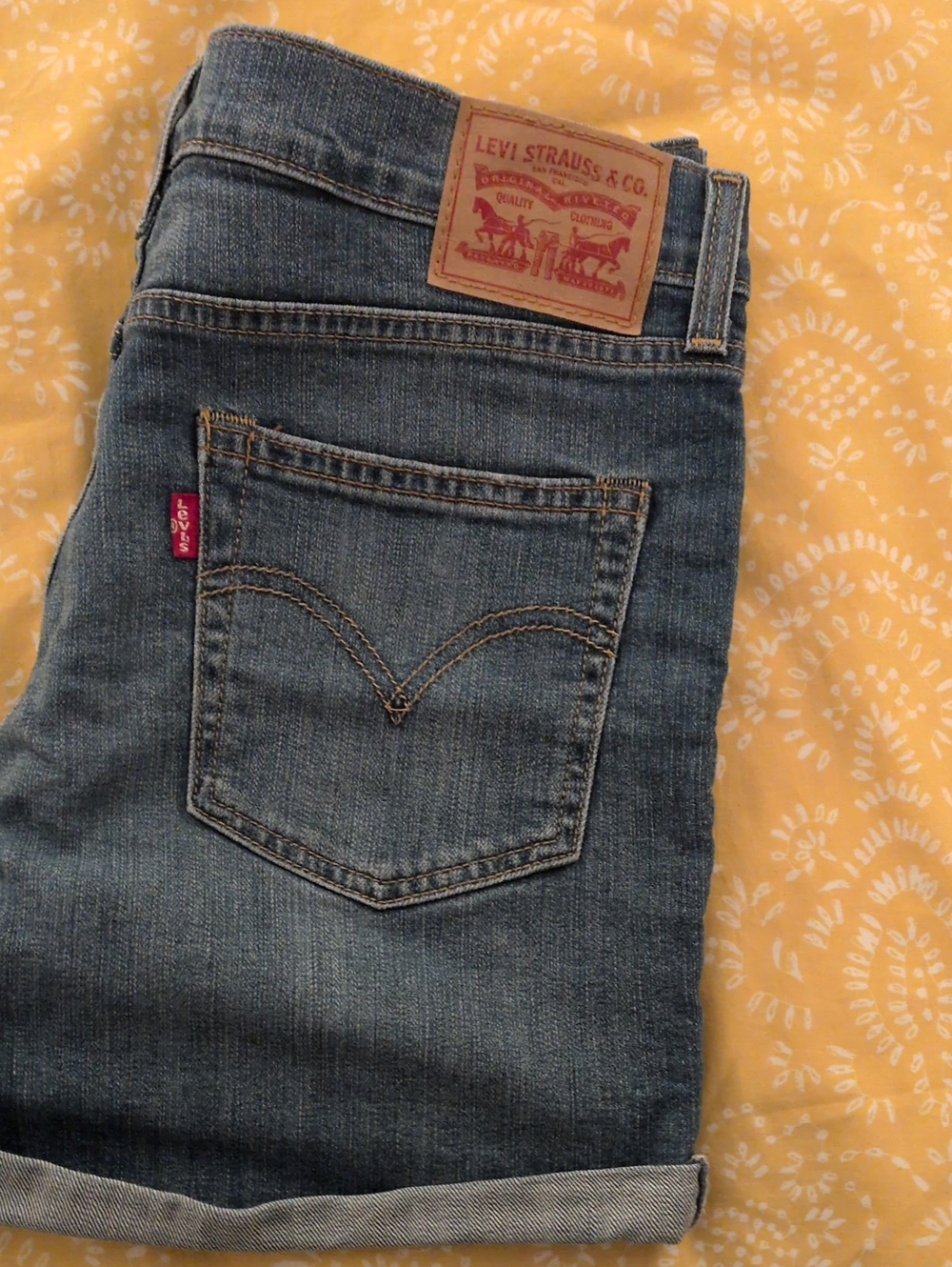 Levi's Women's Medium Blue Slim Denim Jean Shorts with Rolled Hem